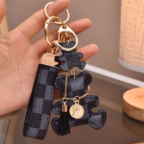 louis vuitton dog keychain fake|Louis Vuitton teddy bear keychain.